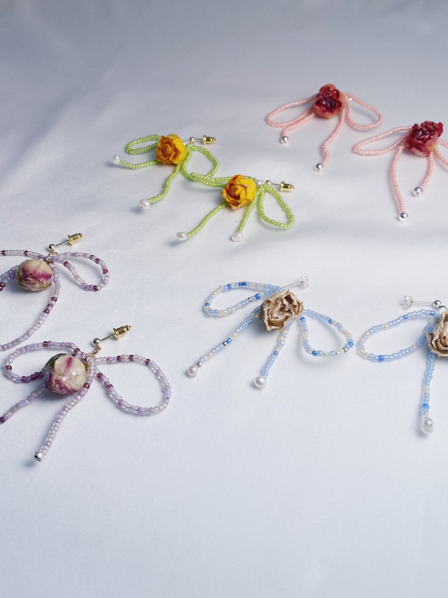 Dainty rose bead bow drops