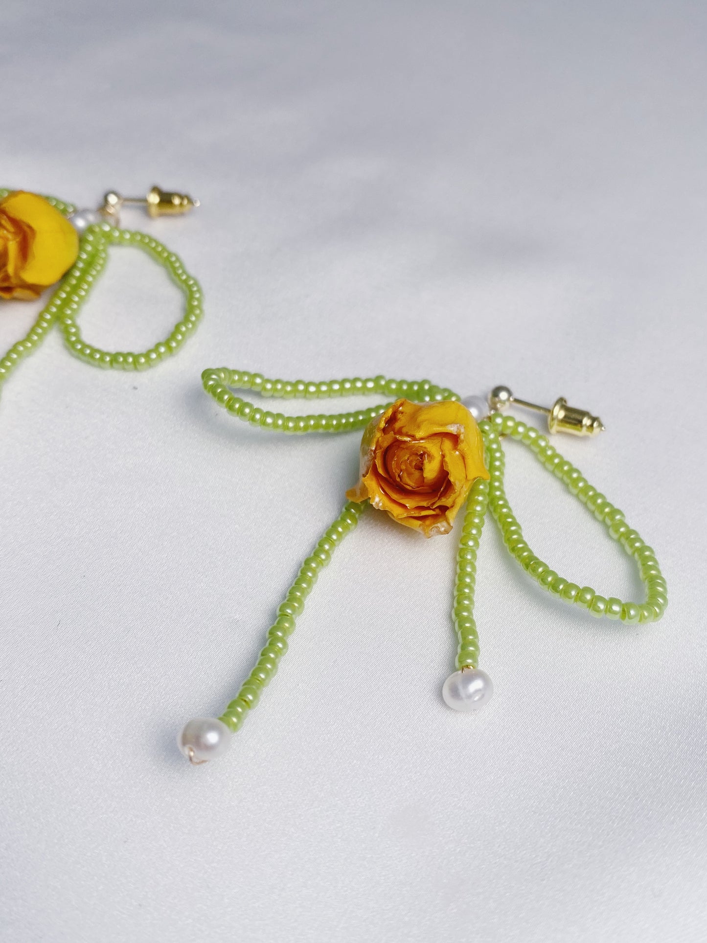 Dainty rose bead bow drops