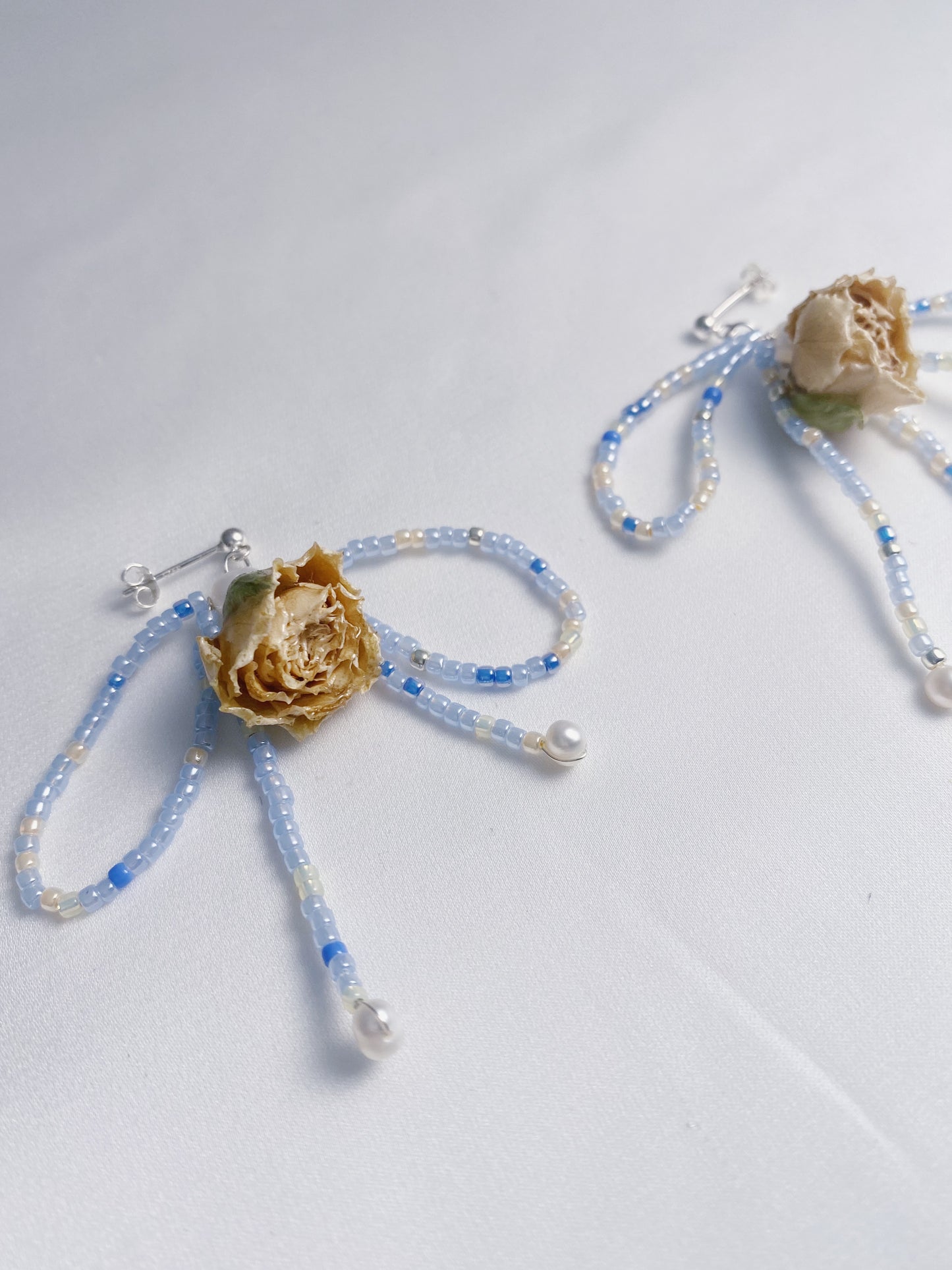 Dainty rose bead bow drops