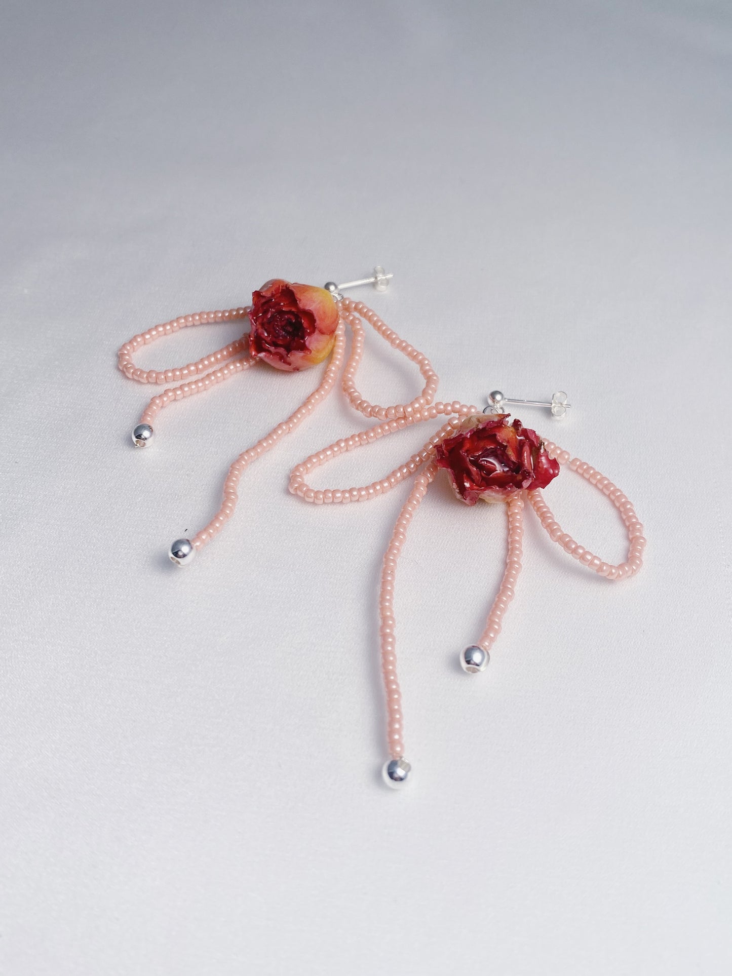 Dainty rose bead bow drops