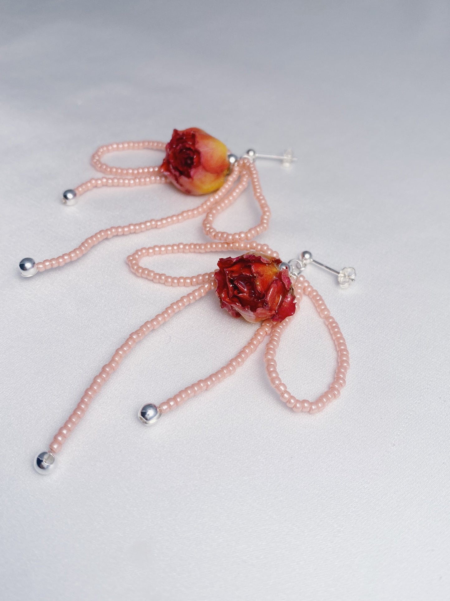 Dainty rose bead bow drops