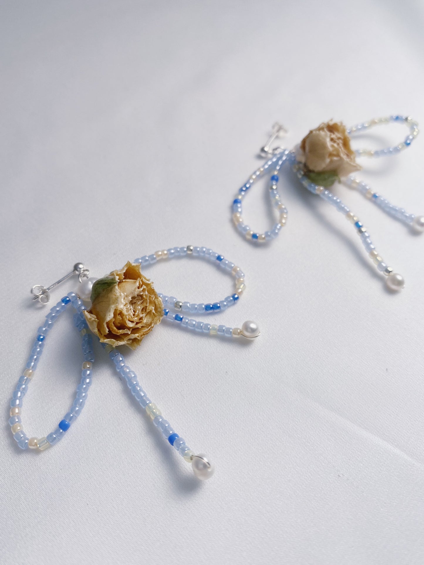 Dainty rose bead bow drops