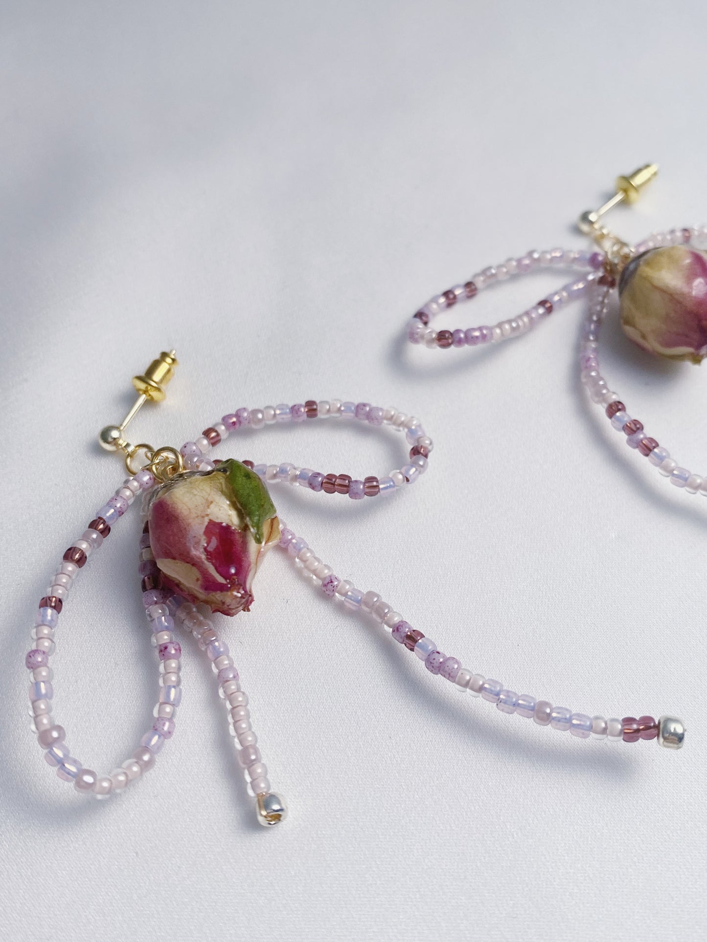 Dainty rose bead bow drops